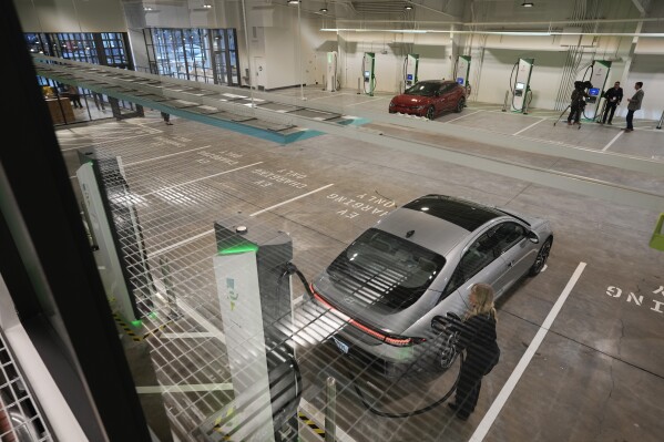 Can i charge my tesla at electrify shop america